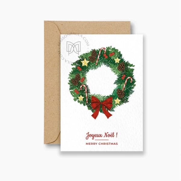 Carte de voeux Noël et nouvel an, avec une couronne décorative. Dessinée par Pauline de Maison Paula.